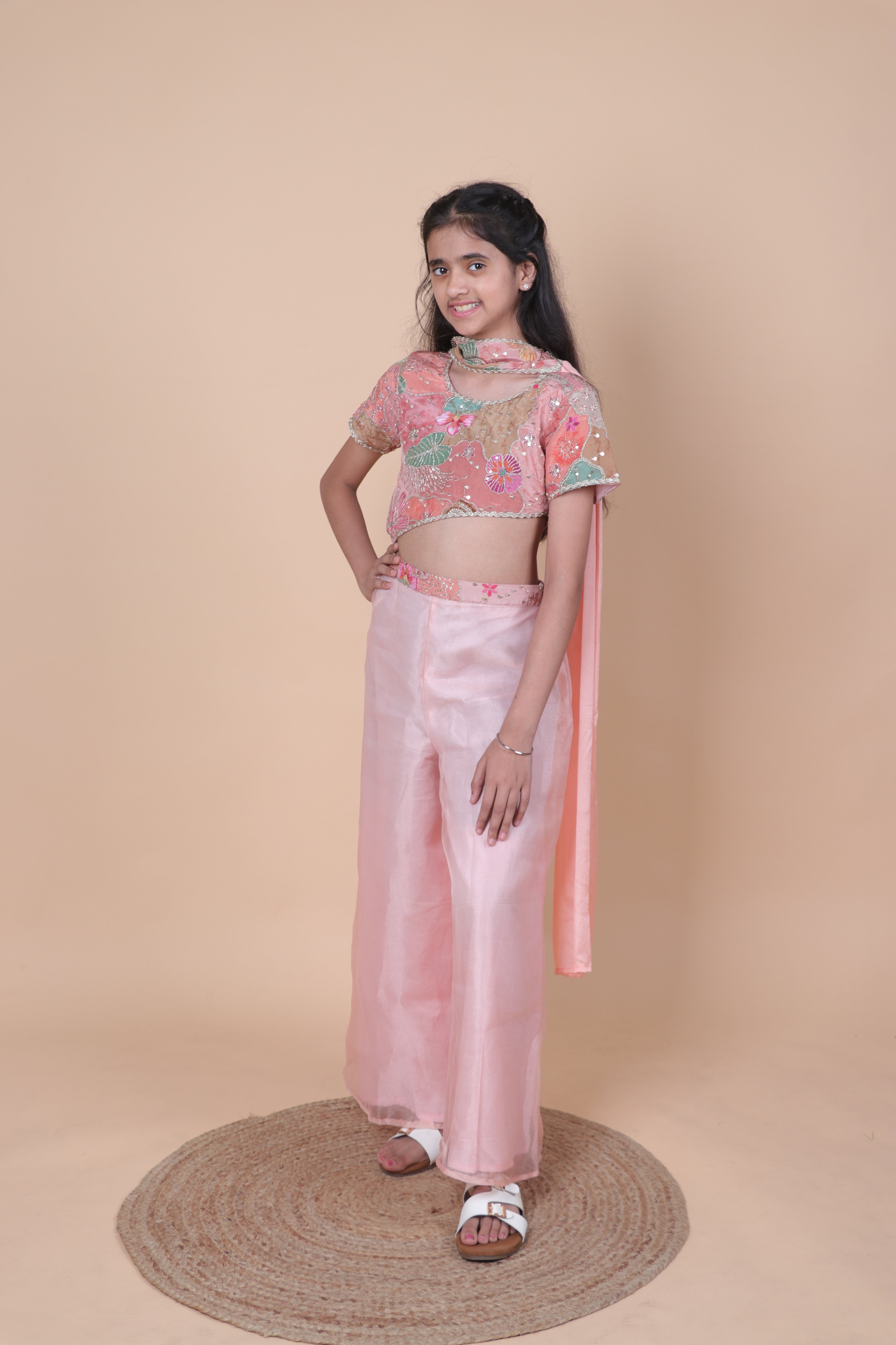 PURE CREPE ZARI EMBROIDERED PEACH TOP WITH FLARED TISSUE PALAZZO.