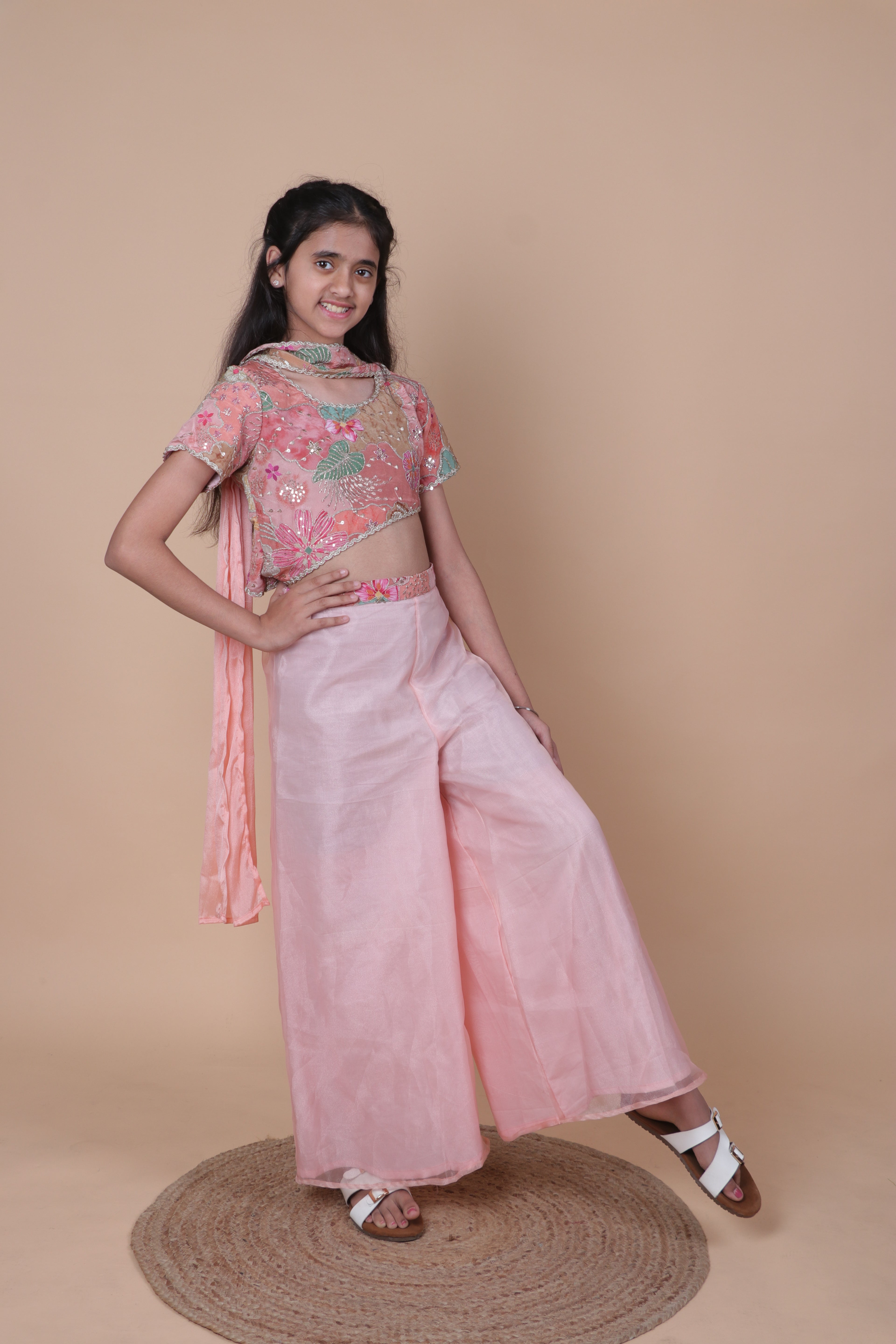 PURE CREPE ZARI EMBROIDERED PEACH TOP WITH FLARED TISSUE PALAZZO.