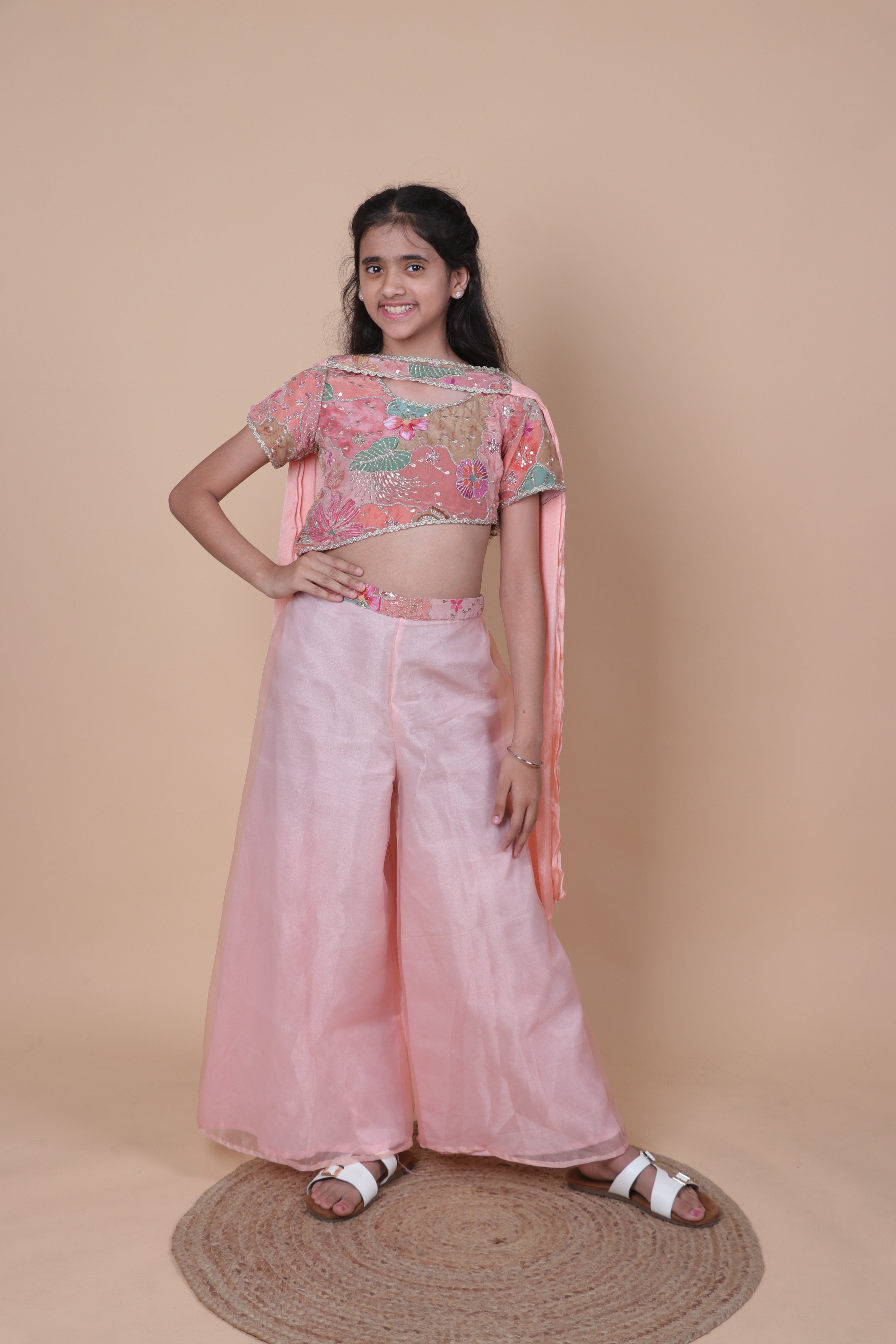 PURE CREPE ZARI EMBROIDERED PEACH TOP WITH FLARED TISSUE PALAZZO.
